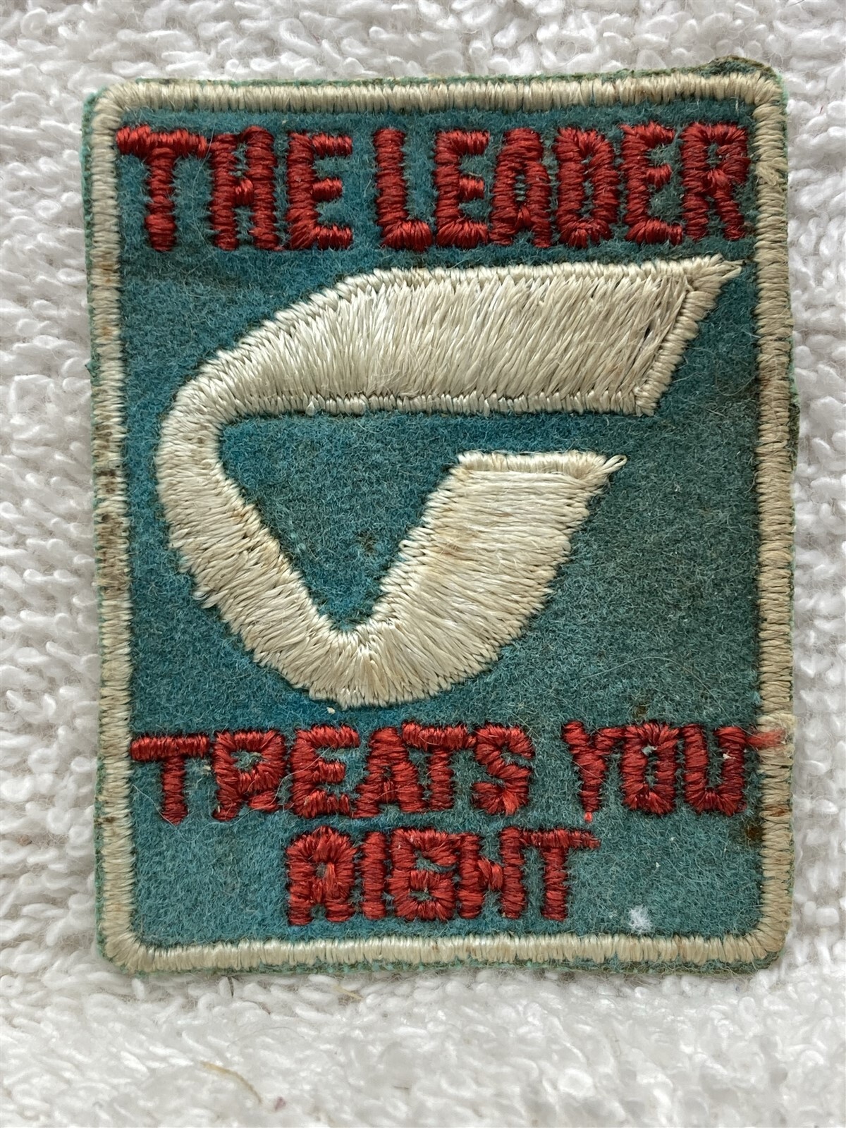 1960s 1970s The Leader Treats You Right Unknown Business Newspaper Patch Vtg