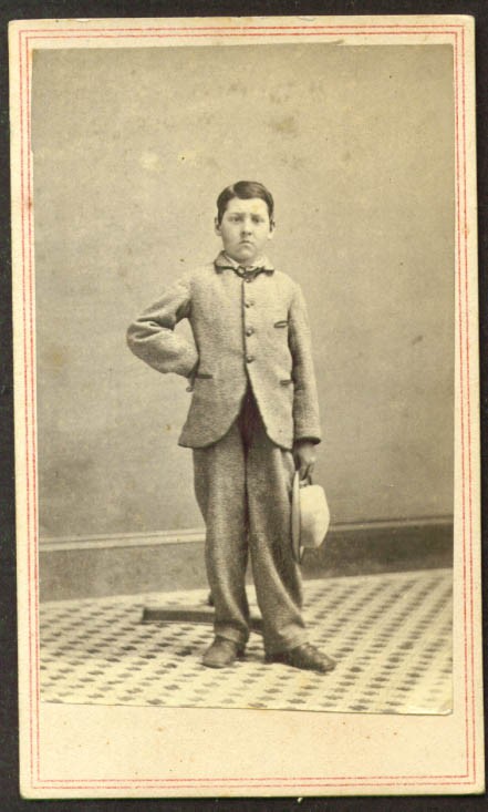 Youth in suit holding white felt hat CDV place unknown