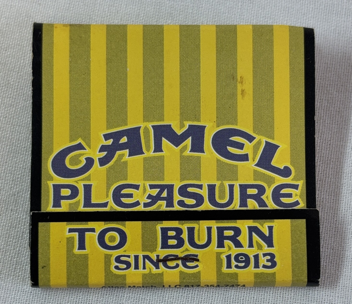 2000 matchbook ~ CAMEL CIGARETTES Pleasure To Burn Since 1913