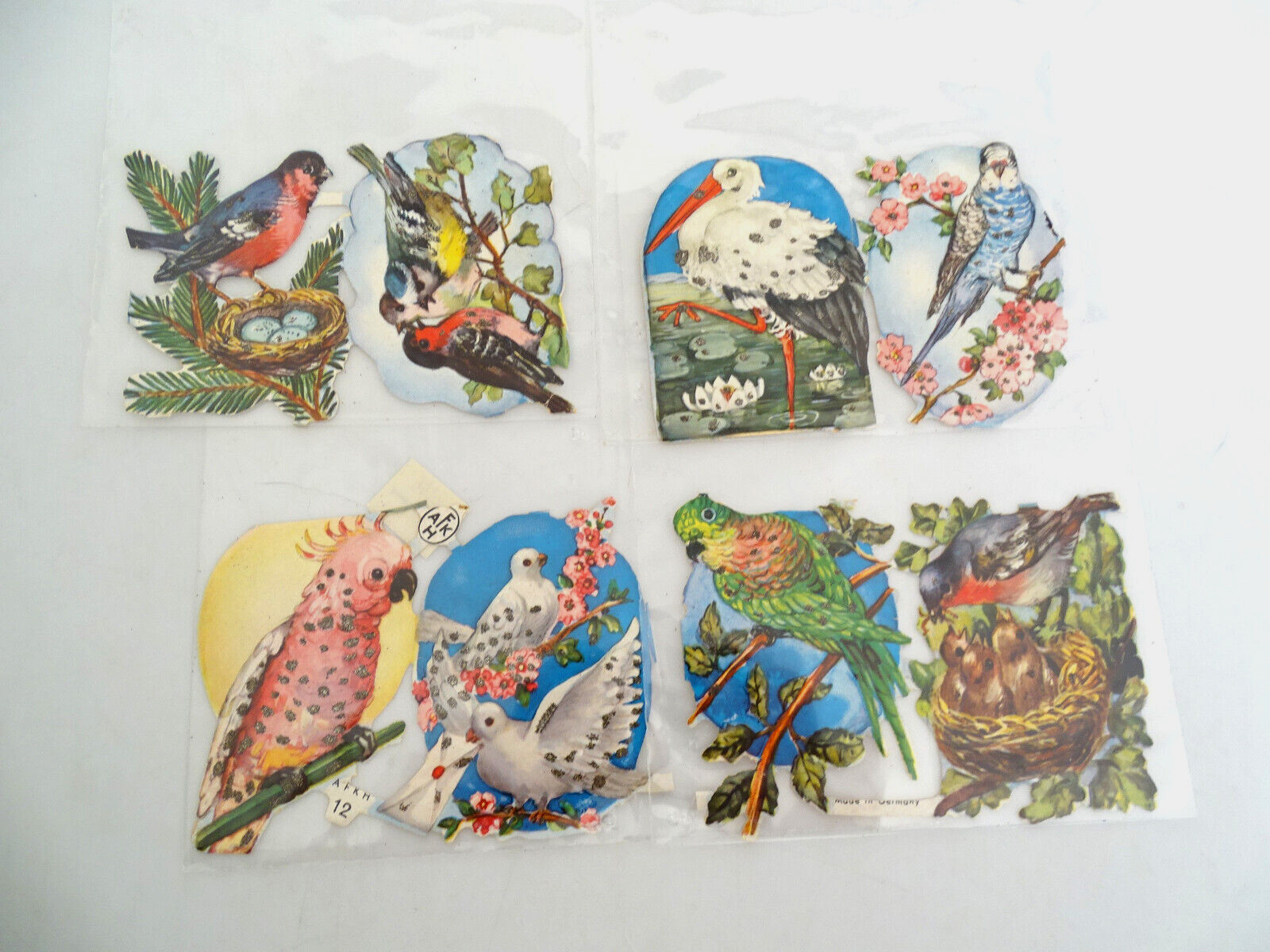 Vintage German (8) Die Cuts w/Silver Glitter of Various Birds 2 7/8″ Tall