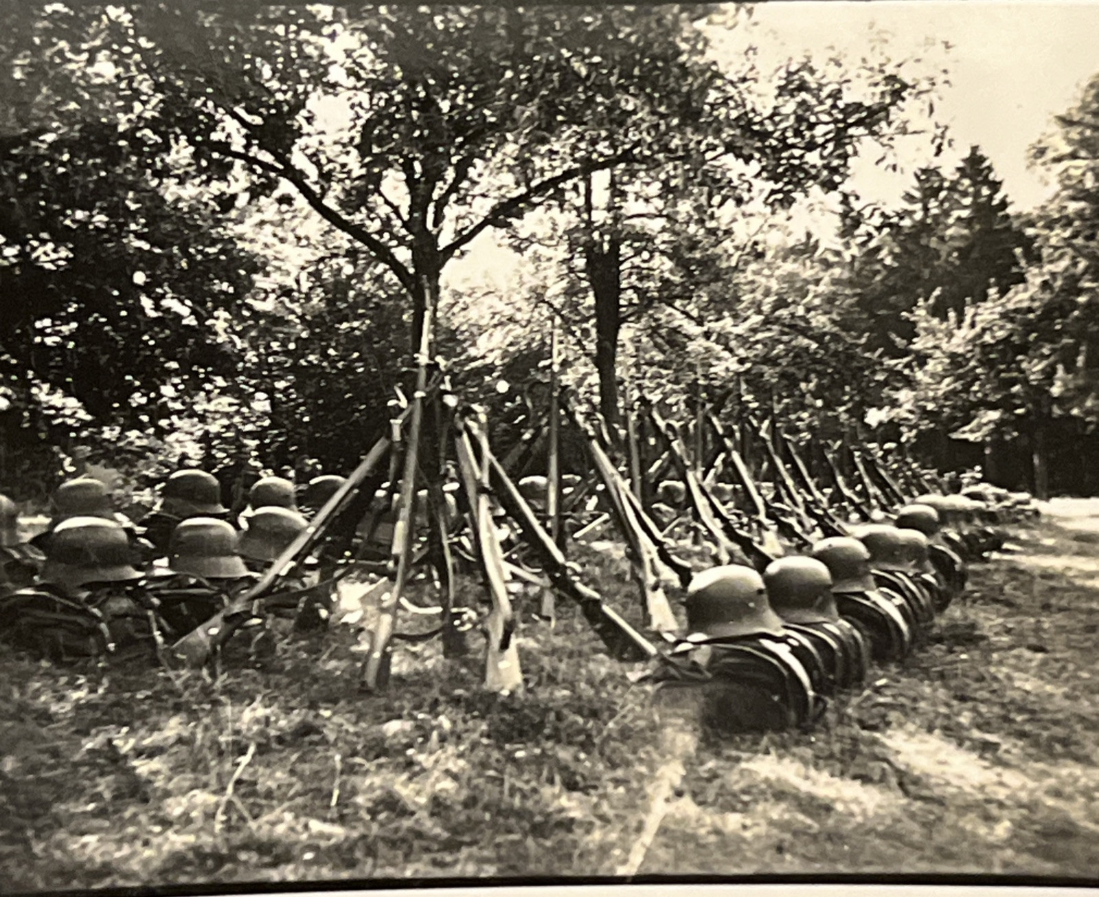 STEEL HELMETS AND RIFLES LINED UP WW2 WWII German Third Reich Military photo
