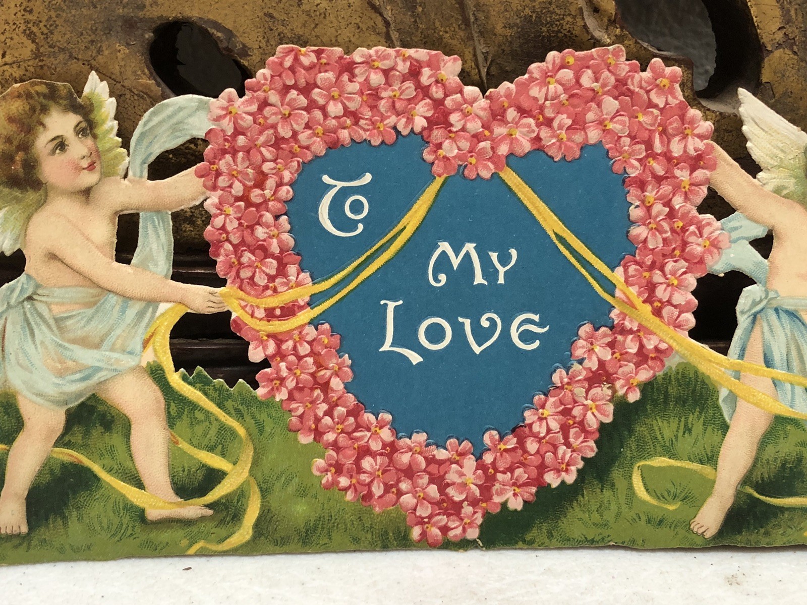 Scrap of 2 Cherubs Holding Ribbons in Heart Shape “To My Love”