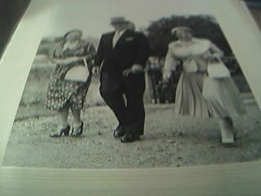 b/w photograph 8 x 6 inches wedding day three well dressed people C 1950s