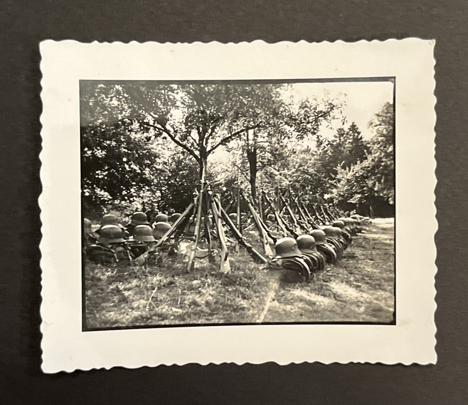 STEEL HELMETS AND RIFLES LINED UP WW2 WWII German Third Reich Military photo