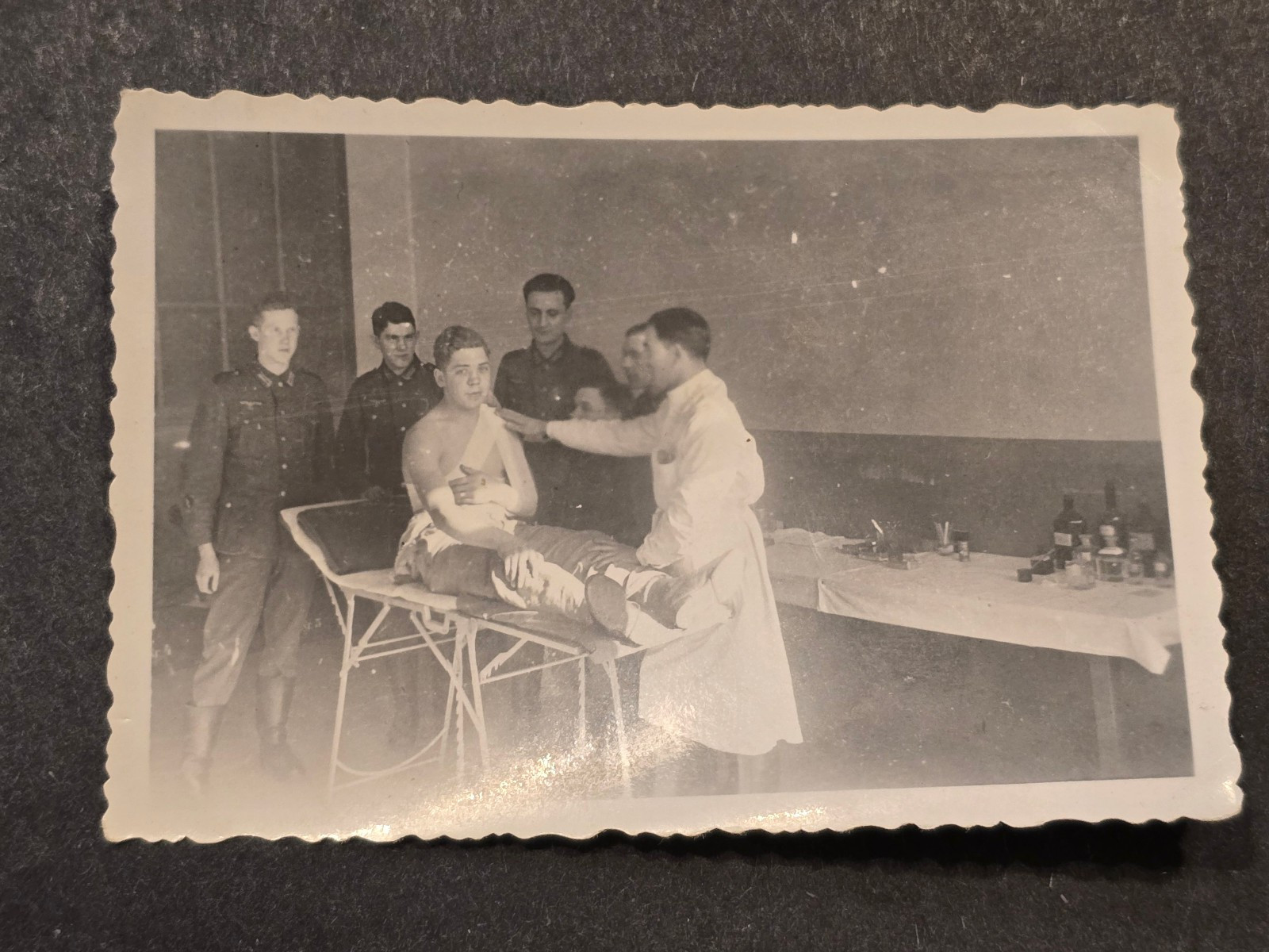 WWII German Medical Scene Soldiers w Doctor Treating Wounded Man Field Photo