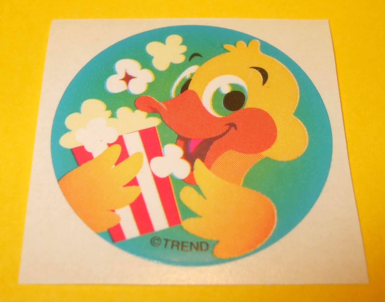 VTG 80s 90s TREND Scratch & Sniff Butter POPCORN Scent Smell Duck Ducky STICKER