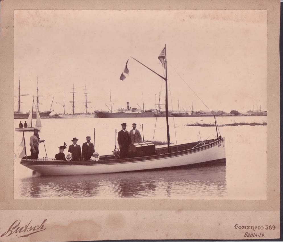 5 folks 2 kids on idle sailboat Comercio 569 Santa-Fe by Lutsch photo c 1910
