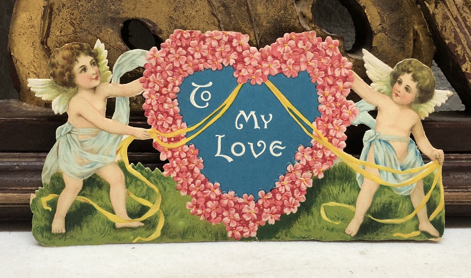 Scrap of 2 Cherubs Holding Ribbons in Heart Shape “To My Love”