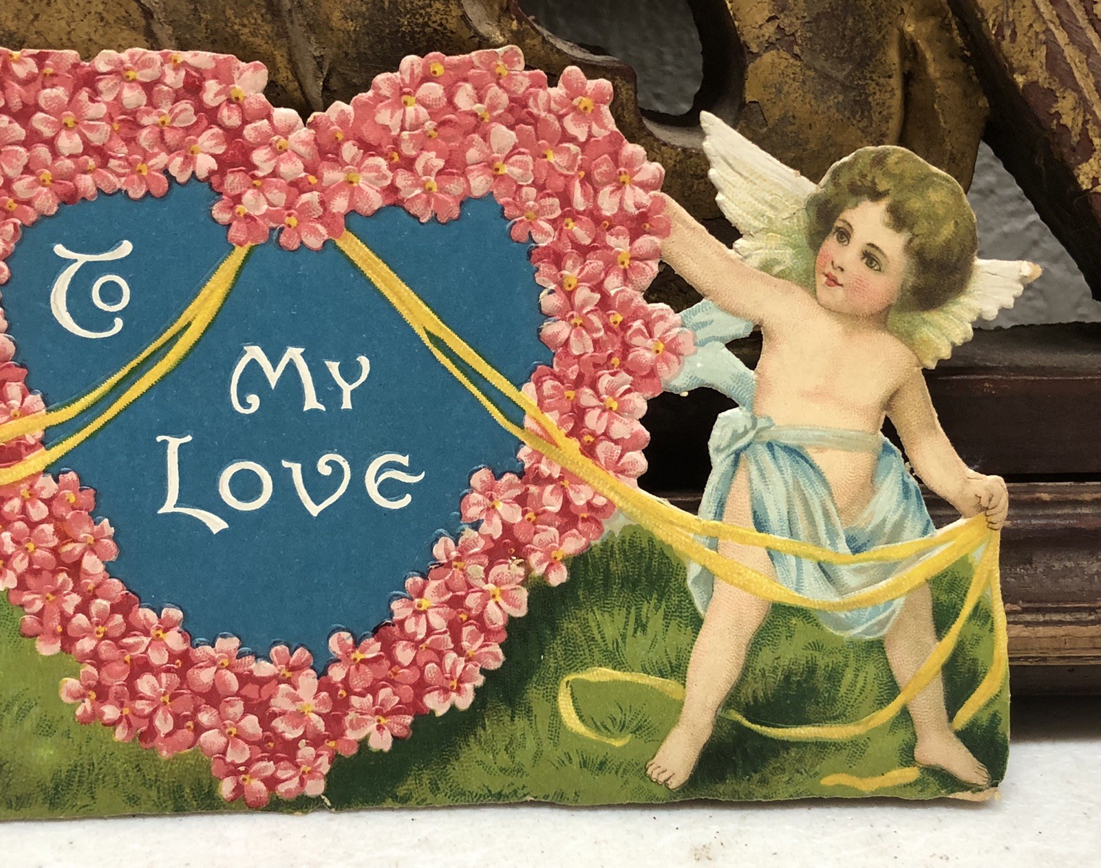 Scrap of 2 Cherubs Holding Ribbons in Heart Shape “To My Love”
